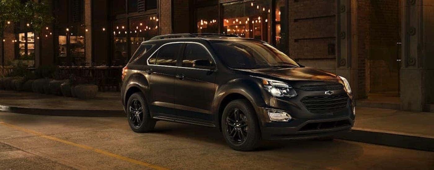 A black 2017 Chevy Equinox is shown from the front at an angle.