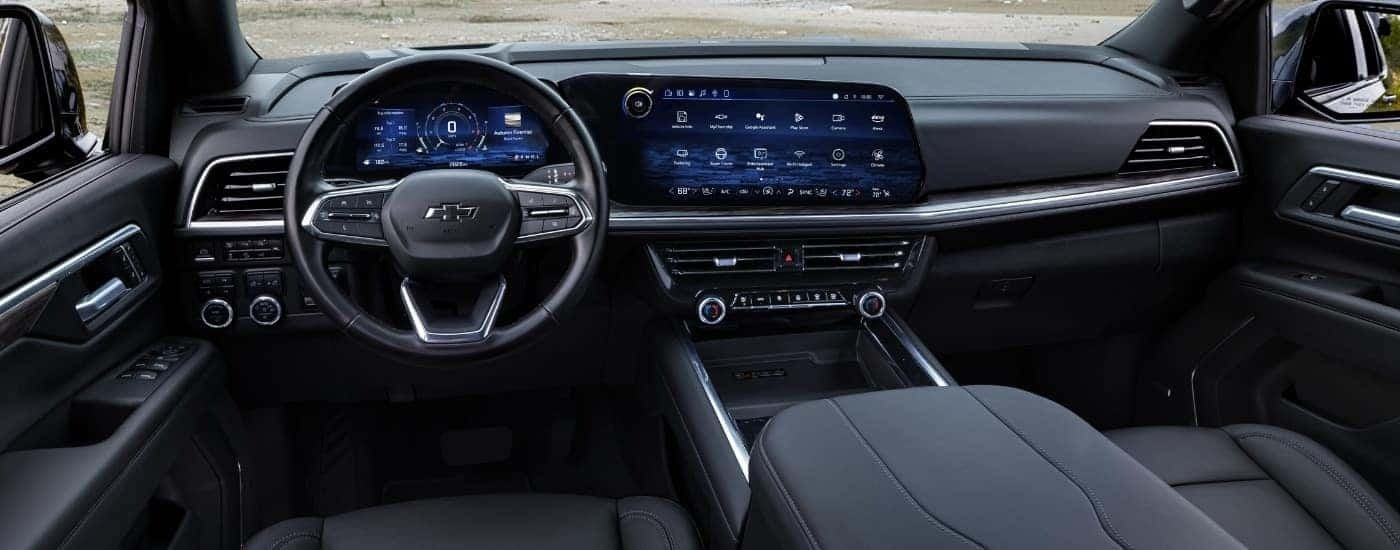 The black interior of a 2025 Chevy Tahoe for sale is shown.