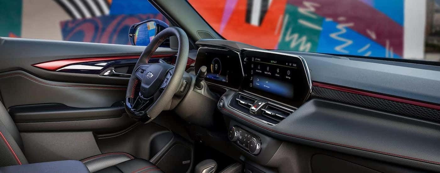 The steering wheel and infotainment screen in a 2025 Chevy Trailblazer for sale.
